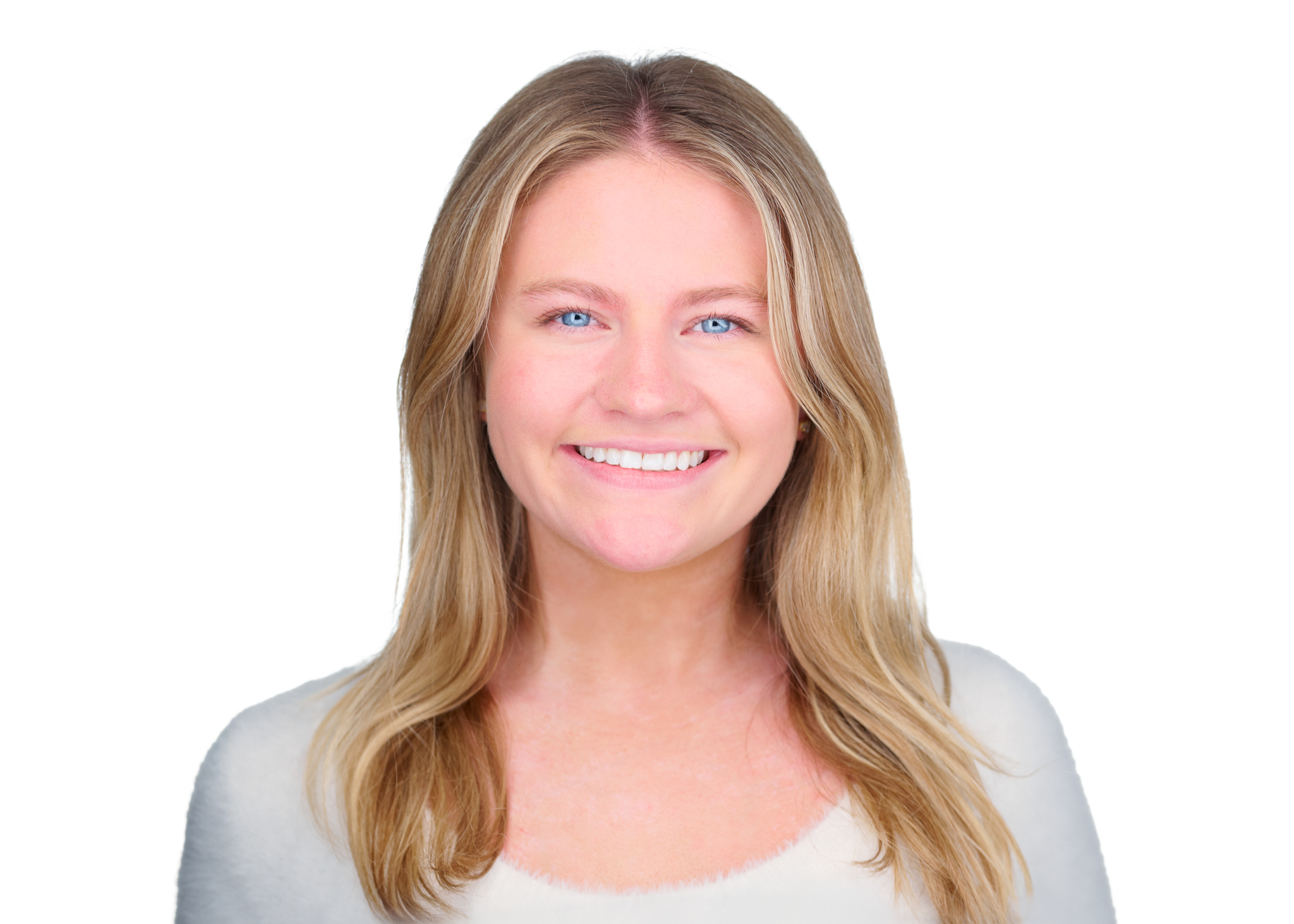 Professional headshot of a smiling woman with long blonde hair against a light background